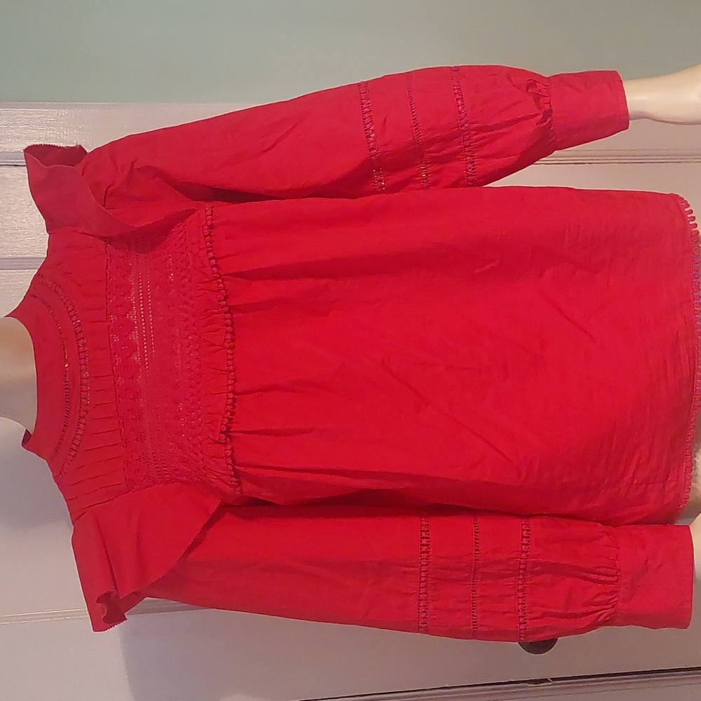 J crew top.  Xxs but fits like a small. It runs big.